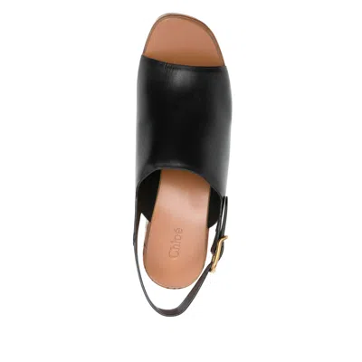 Chloé Maxime Black Wedge With Engraved Written Decorations And Logo Buckle In Leather Woman In Black