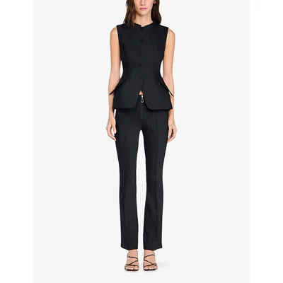Sandro Peplum Jacket In Black