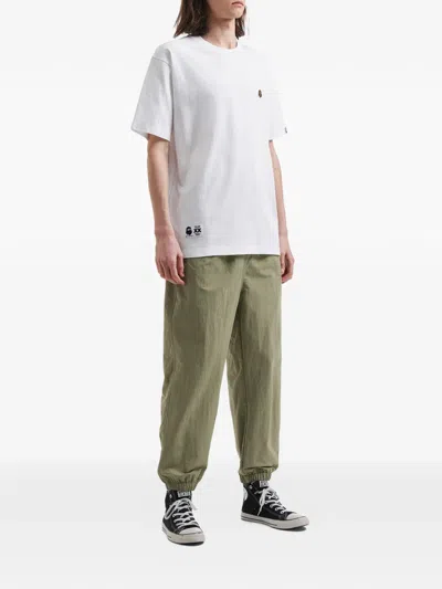 Fingercroxx Drawstring Logo-detail Track Pants In Multi