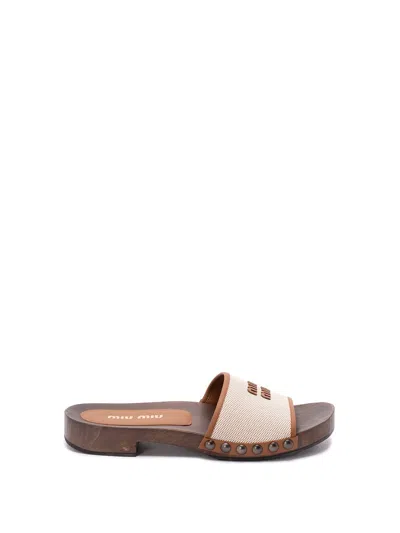 Miu Miu Canvas And Leather Studded Clog Sandals In Neutral