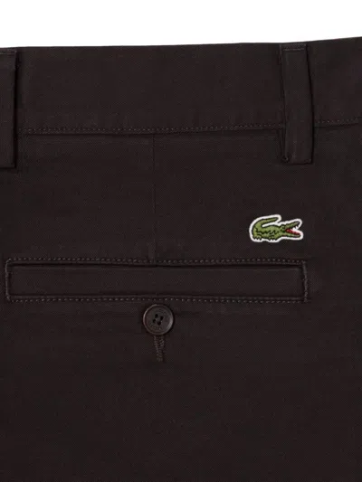 Lacoste Buttoned Chinos In Brown