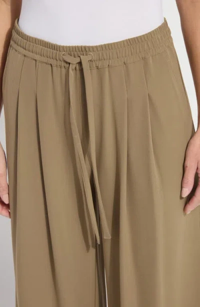 Lyssé Mae Pleated Drawstring Wide Leg Pants In Olive Leaf In Brown