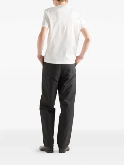 Prada Logo-embroidered T-shirt In Neutral