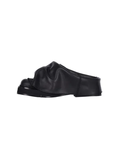 Attico Round Toe Leather Slip-on Sandals In Black