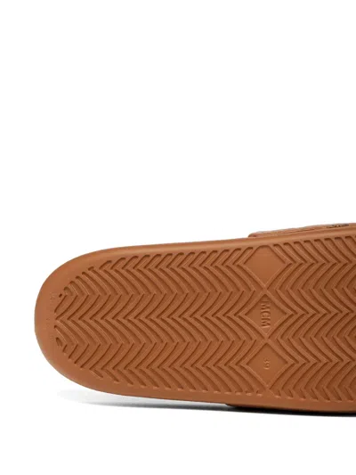 Mcm Male Monogram Print Rubber Slides In Brown