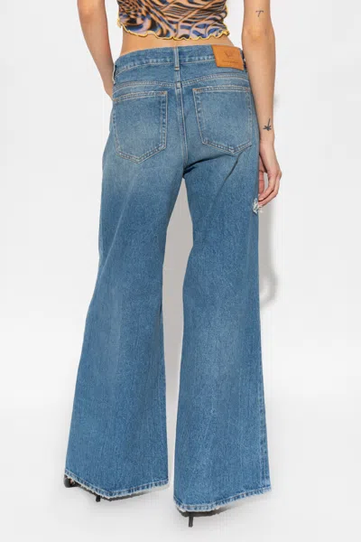 Diesel Distressed Bootcut Jeans In Blue