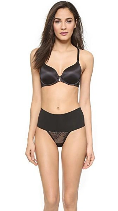 Shop Spanx Undie-tectable Lace Thong In Black
