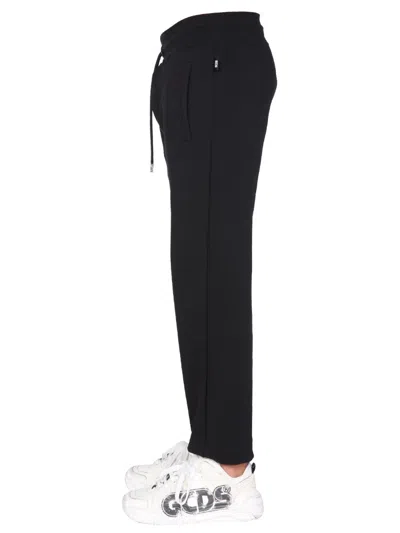 Gcds Stylish Jogging Pants With Signature Logo Band In Black