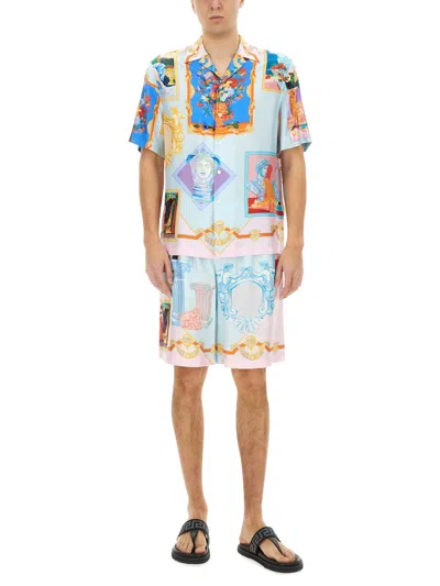 Versace Printed Silk Shorts In Blue