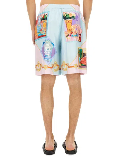 Versace Printed Silk Shorts In Blue