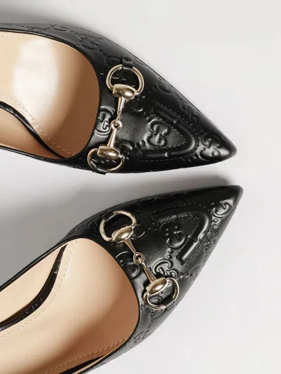 Gucci Calf Leather Bos Taurus Mid Heel Pumps In Animal Print