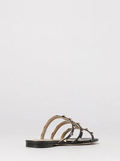 Valentino Rockstud Slide Sandal In Laminated Nappa With Cabochon In Black