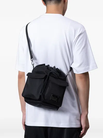 Makavelic Drawstring Double-pocket Shoulder Bag In Black
