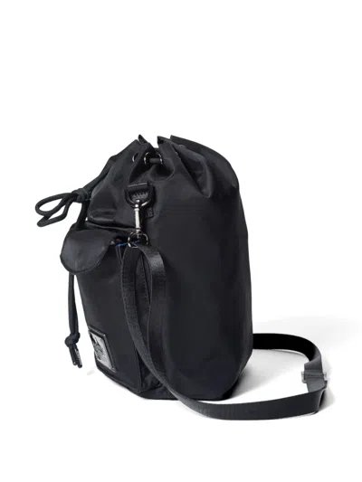 Makavelic Drawstring Double-pocket Shoulder Bag In Black