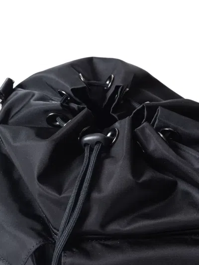 Makavelic Drawstring Double-pocket Shoulder Bag In Black