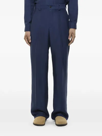 Laneus Buttoned-flap-pocket Trousers In Blue