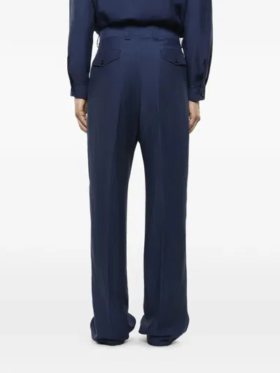 Laneus Buttoned-flap-pocket Trousers In Blue