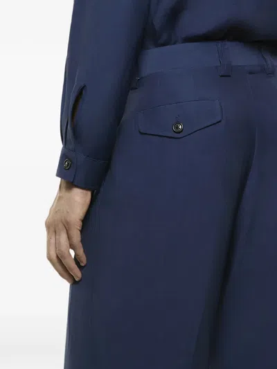 Laneus Buttoned-flap-pocket Trousers In Blue