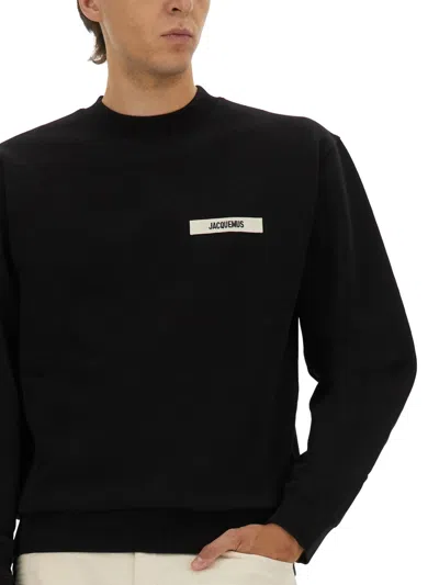 Jacquemus Relaxed Fit Long-sleeve Shirt With Minimalist Patch Detail In Black