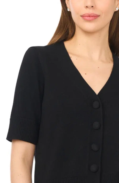 Cece Covered Button Short Sleeve Cardigan In Black
