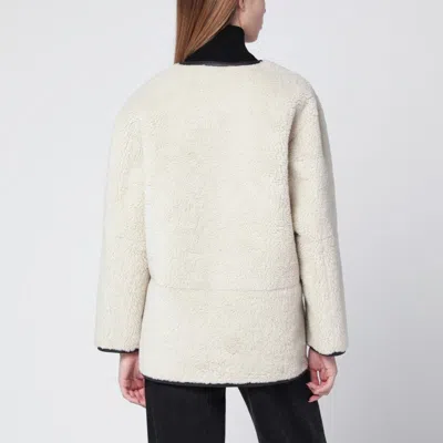 Dunst Collarless Buckled Shearling Jacket Cream In Neutral