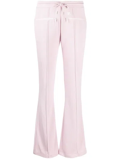 Courrèges Flared Trousers With Logo Patch In Pattern