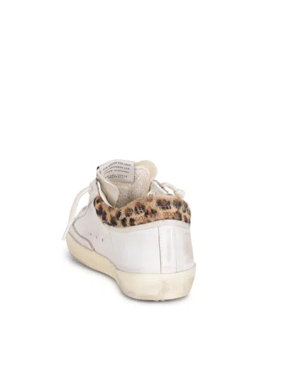 Golden Goose Super-star Sneakers In Suede With Worn Effect And Leopard Print Hairy Cow In White