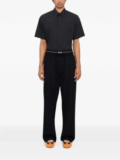 Msgm Drawstring-fastening Logo-waistband Trousers In Black