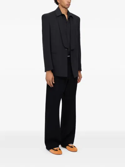 Msgm Drawstring-fastening Logo-waistband Trousers In Black