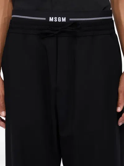 Msgm Drawstring-fastening Logo-waistband Trousers In Black