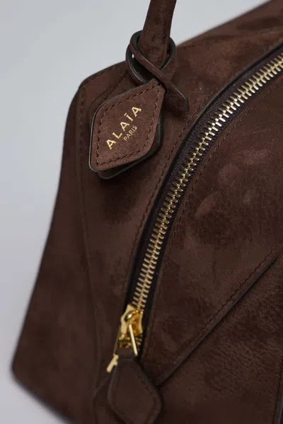 Alaïa Le Bouledogue Bowling Shoulder Bag In Nubuck Leather In Brown