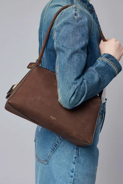 Alaïa Le Bouledogue Bowling Shoulder Bag In Nubuck Leather In Brown