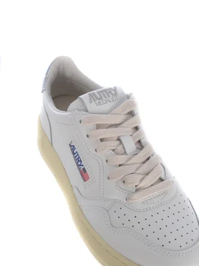 Autry Low-top Sneakers With Perforated Detailing And Metallic Accents In White