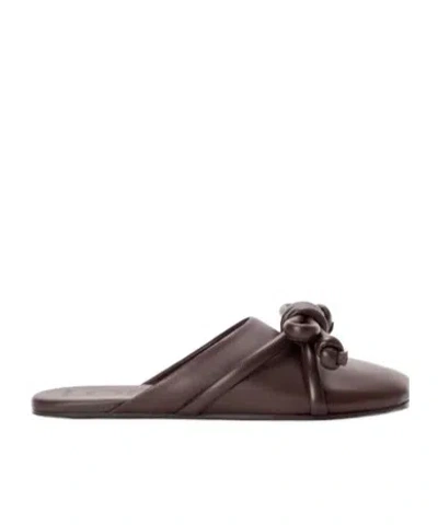 Loewe Bowknot Leather Mules In Animal Print