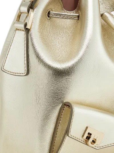 Ferragamo Multipocket Bucket Bag In Gold