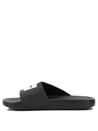 Givenchy Black Sandals With Wide Band And Contrasting Logo Patch In Rubber Man