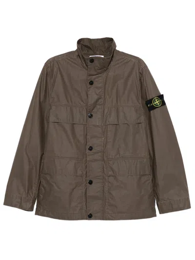 Stone Island Field Jacket With Pigmented Wax Coating In Brown