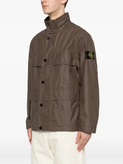 Stone Island Field Jacket With Pigmented Wax Coating In Brown