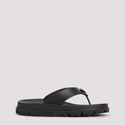Prada Triangle Logo Rubber Thong Sandals In Black