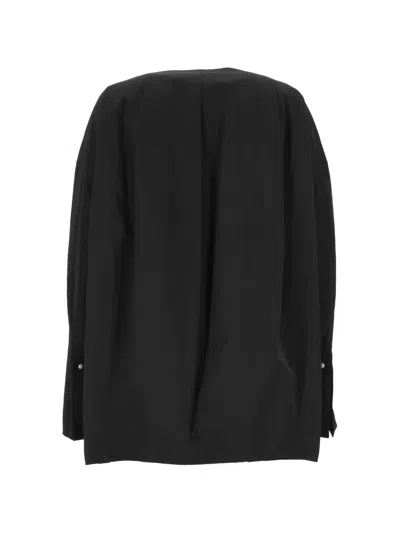 Carven Buttoned Coat In Black