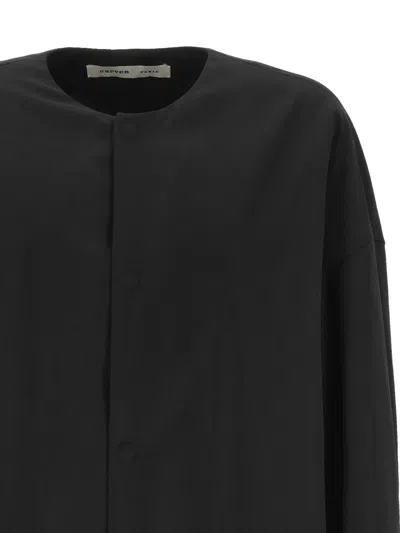 Carven Buttoned Coat In Black