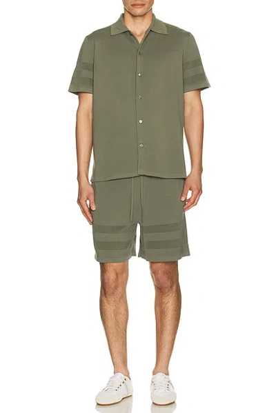 Givenchy Green Textured Shorts In Green