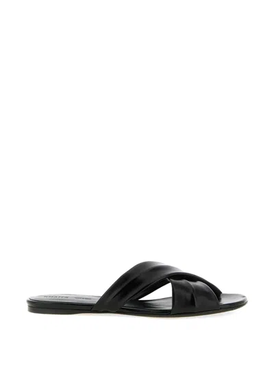 Khaite Liria Glossed-leather Sandals In Black