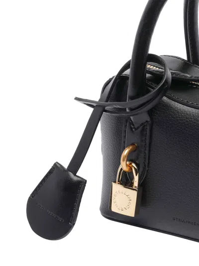 Stella Mccartney Ryder Black Small Handbag With Two Top Handles And Front Padlock Detail With Logo In Ecoleather Woma