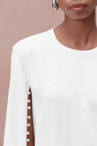 Fabrique Audrey Pearl Short Cape Dress In Triacetate Blend In White