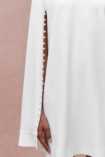 Fabrique Audrey Pearl Short Cape Dress In Triacetate Blend In White