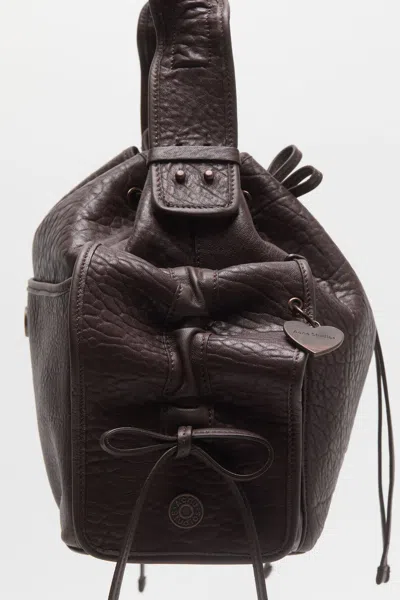 Acne Studios Ruffled Drawstring Shoulder Bag In Brown