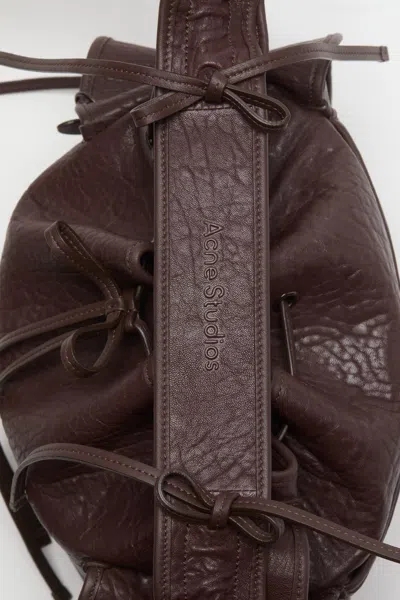 Acne Studios Ruffled Drawstring Shoulder Bag In Brown