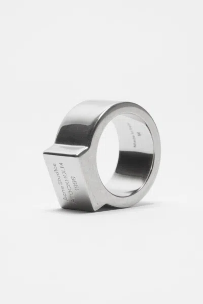 Acne Studios Rectangular-logo Signet Ring In Metallic