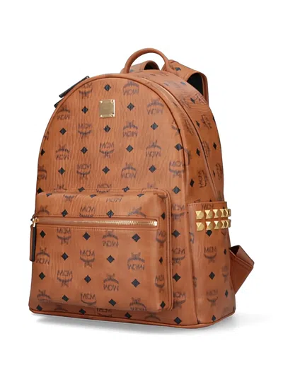 Mcm Logo Studded Backpack In Brown